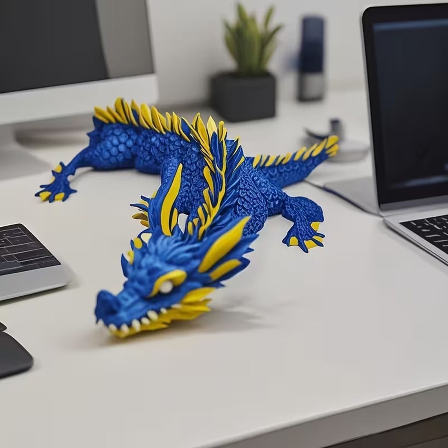 3d Articulated blue and yellow dragon.