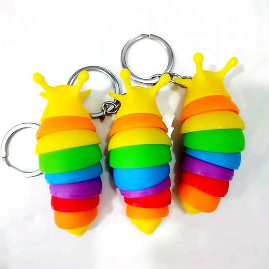Movable fidget slug keyring.